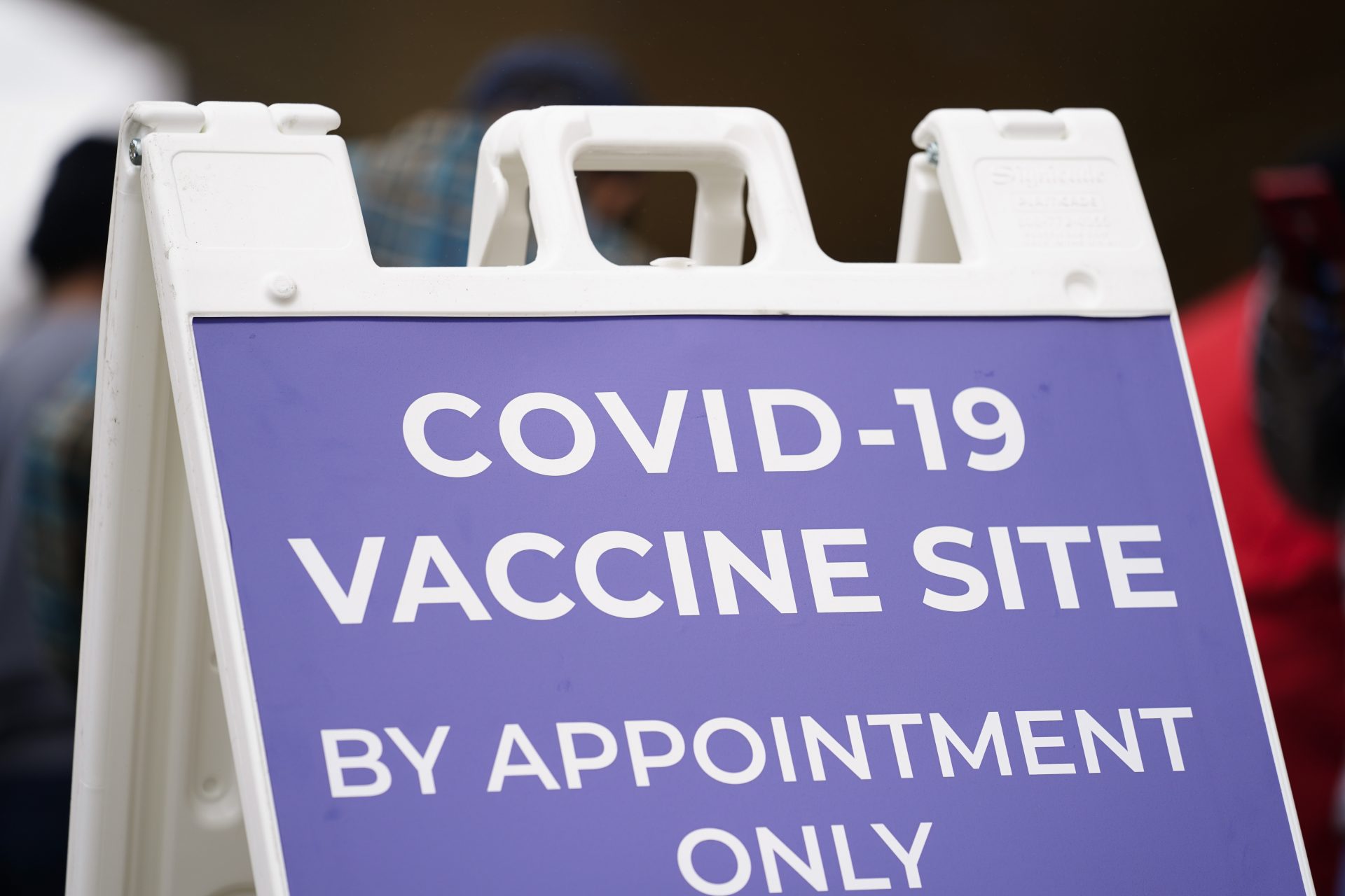 A sign is posted outside a COVID-19 vaccination site in Philadelphia, Wednesday, March 17, 2021.