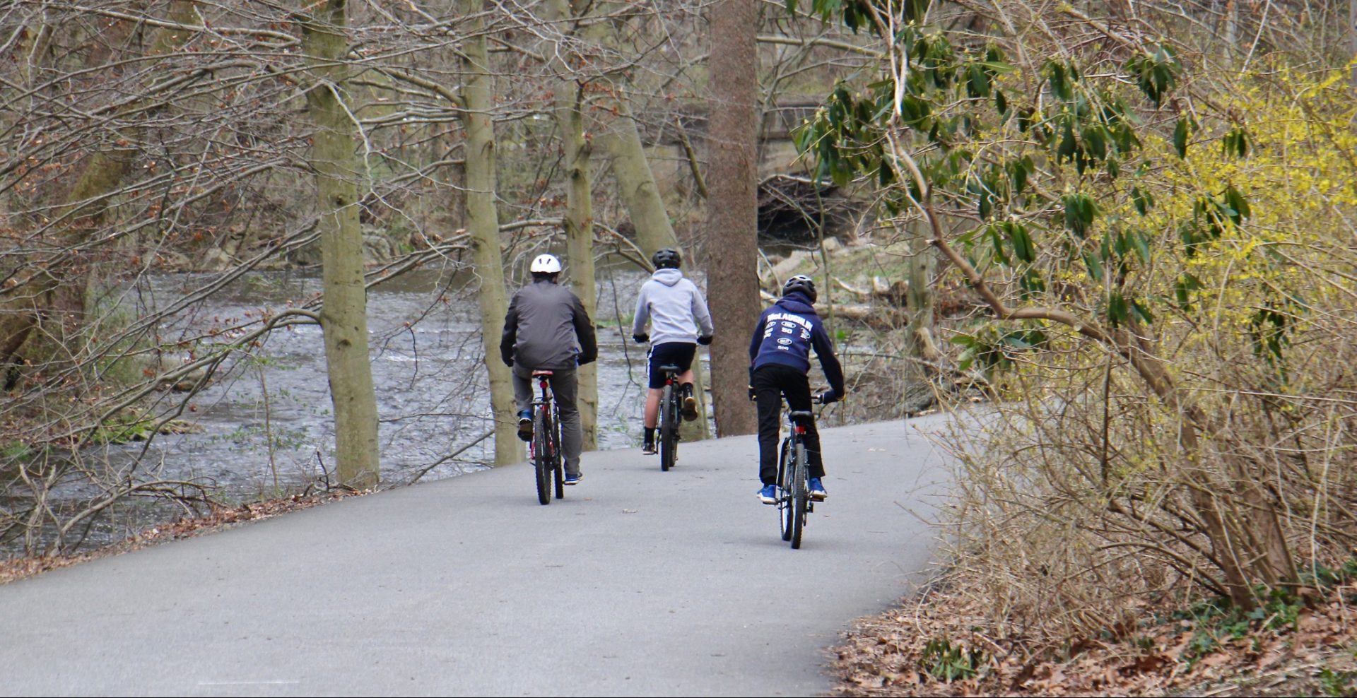 Bicyclists take advantage of the multi-use trail at Ridley State Park in Media, Pa. 
