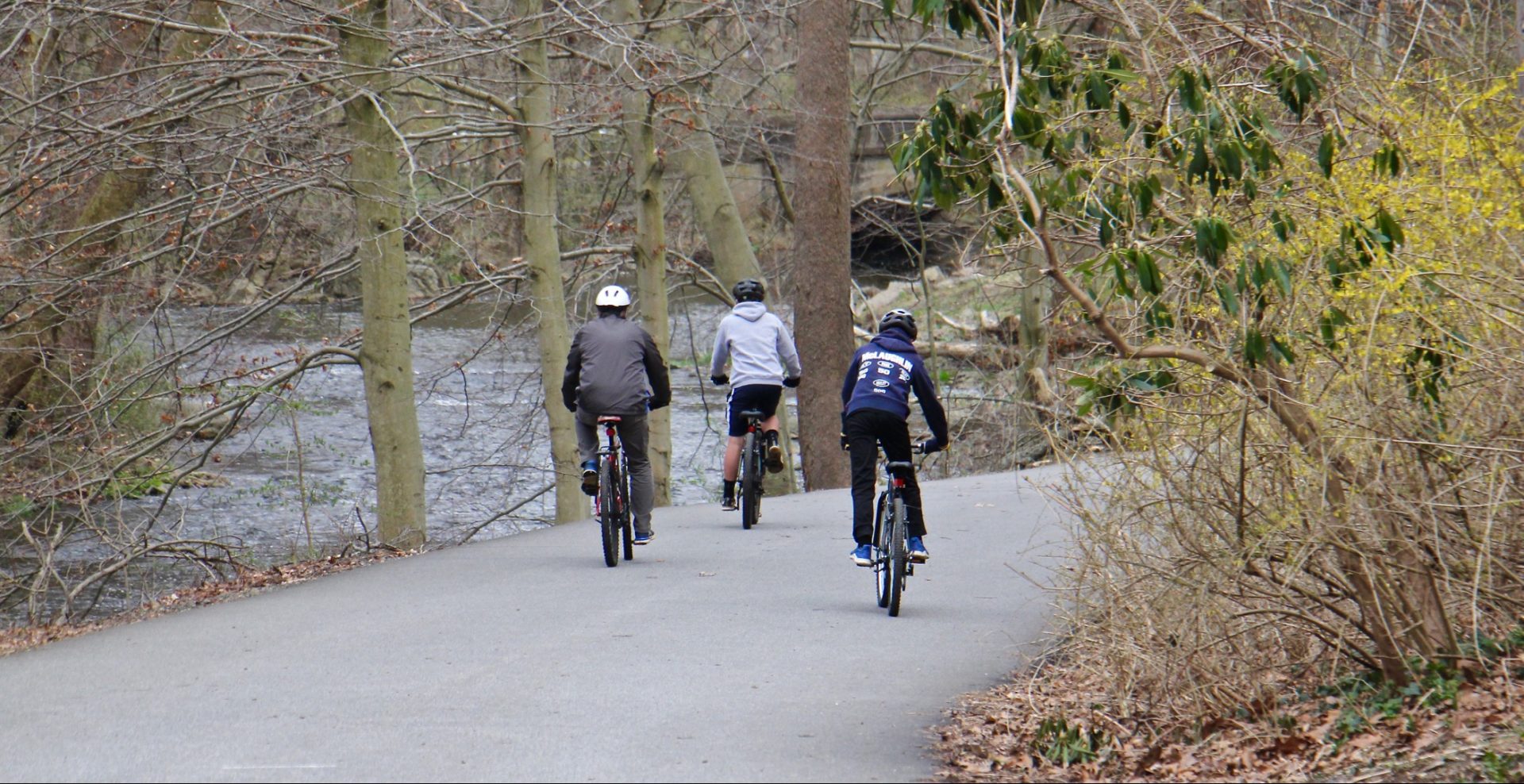 Bicyclists take advantage of the multi-use trail at Ridley State Park in Media, Pa.