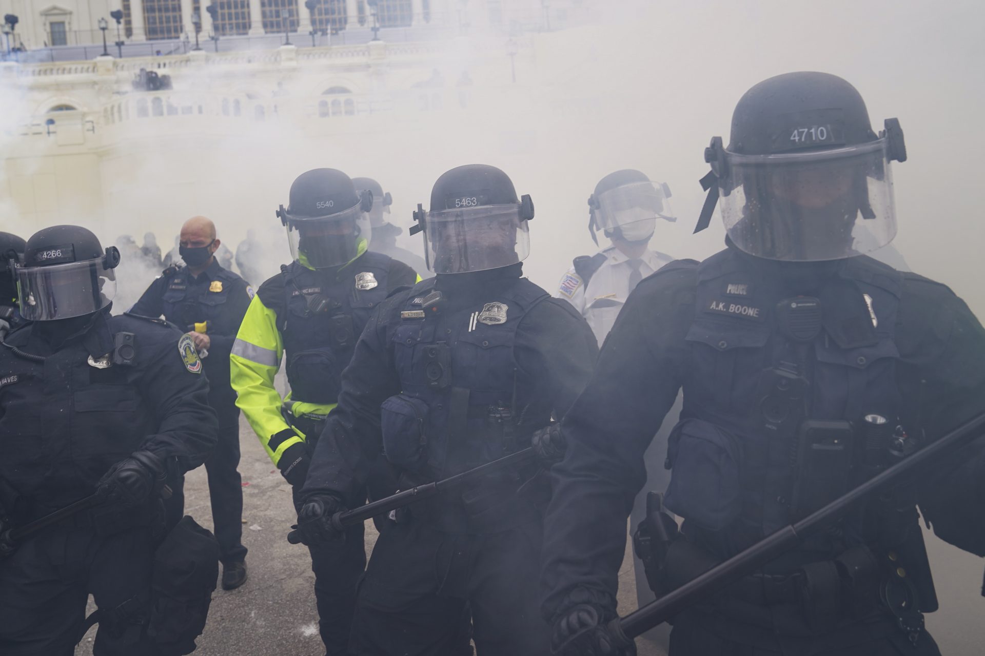 FILE PHOTO: In this Wednesday, Jan. 6, 2021, photo, police form a line to try and prevent violent rioters from storming the Capitol, in Washington.