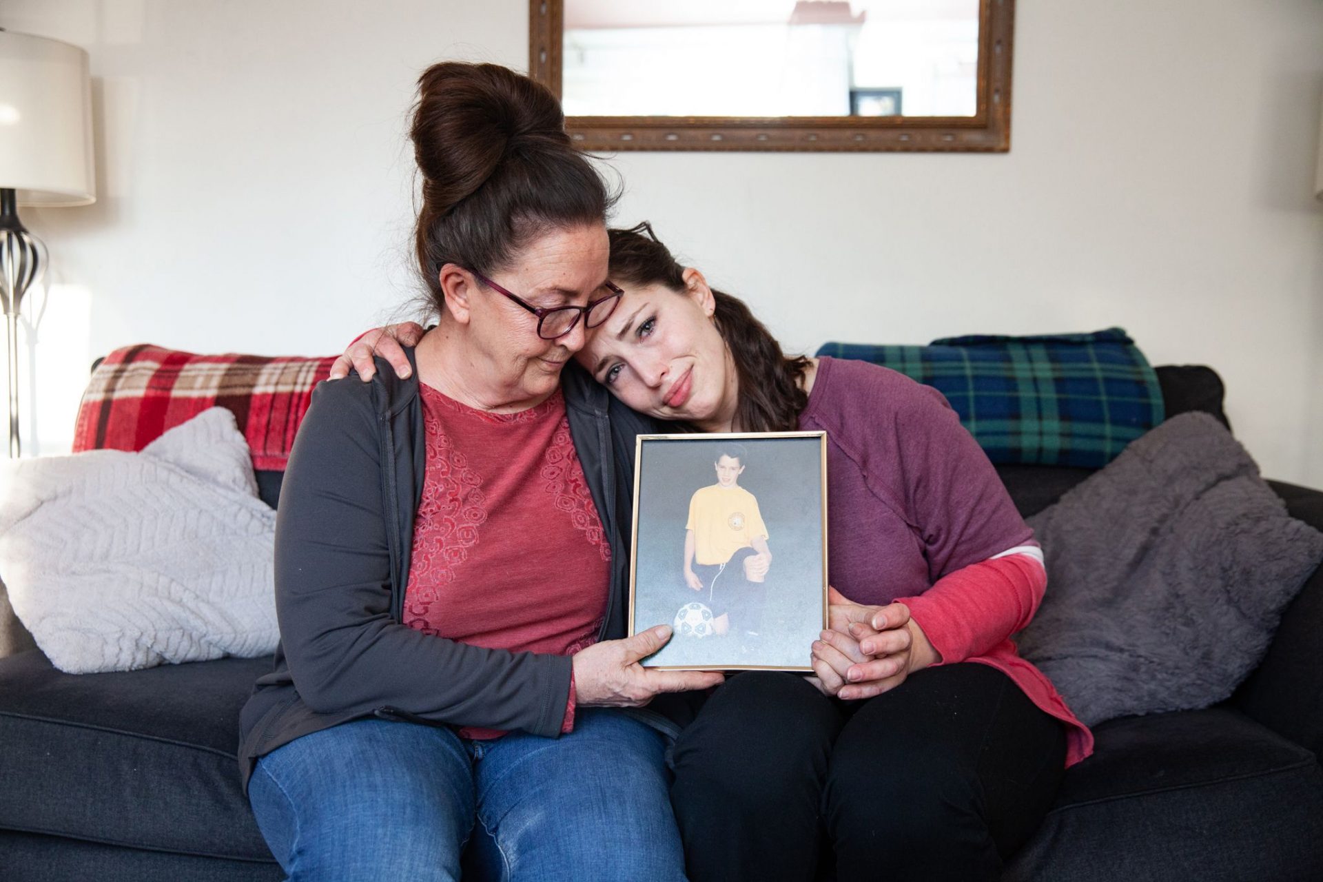 Andrea Zack (left) and her daughter, Amanda Pschirer, are grieving the death of their son and brother, James Pschirer, who died in 2019 of an overdose at a recovery home in Allegheny County. Andrea said she usually avoids looking at pictures of him: “It hurts too much.”