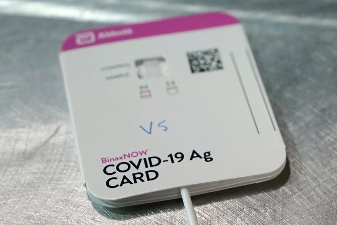 The Food and Drug Administration authorized Abbott's BinaxNOW (seen in photo) and Quidel's QuickVue COVID-19 tests to be sold without a prescription for consumers who want to test themselves repeatedly at home.