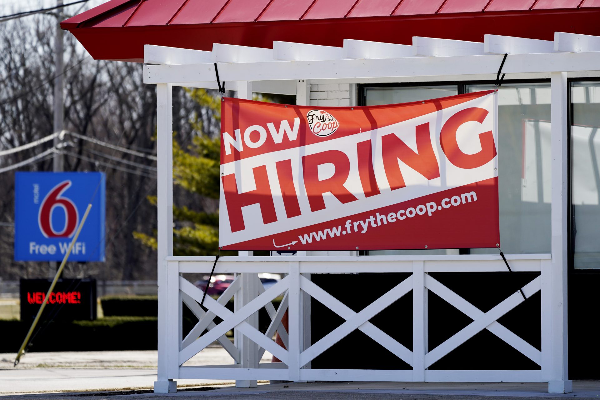 In this March 21, 2021 file photo, a hiring sign shows outside of restaurant in Prospect Heights, Ill.