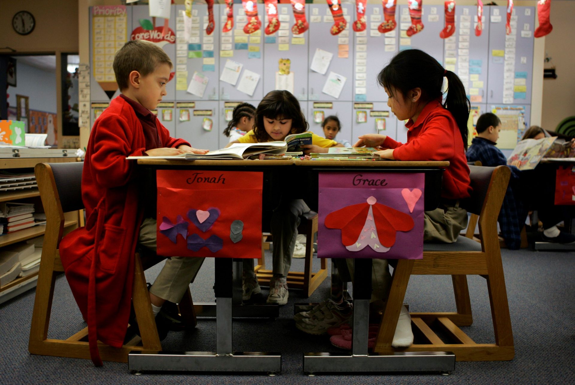 Elementary school students work on their reading during class quiet time at the Milton Hershey School in Hershey, Pa., Tuesday, Feb. 13, 2007. T