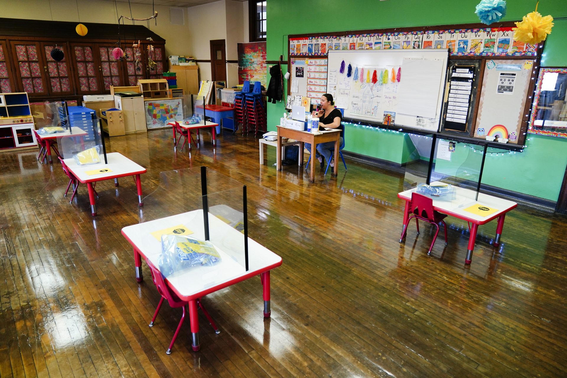 Tara Matise teaches her prekindergarten students virtually in her classroom prepared ahead of planned in-person learning at Nebinger Elementary School in Philadelphia, Friday, March 19, 2021.