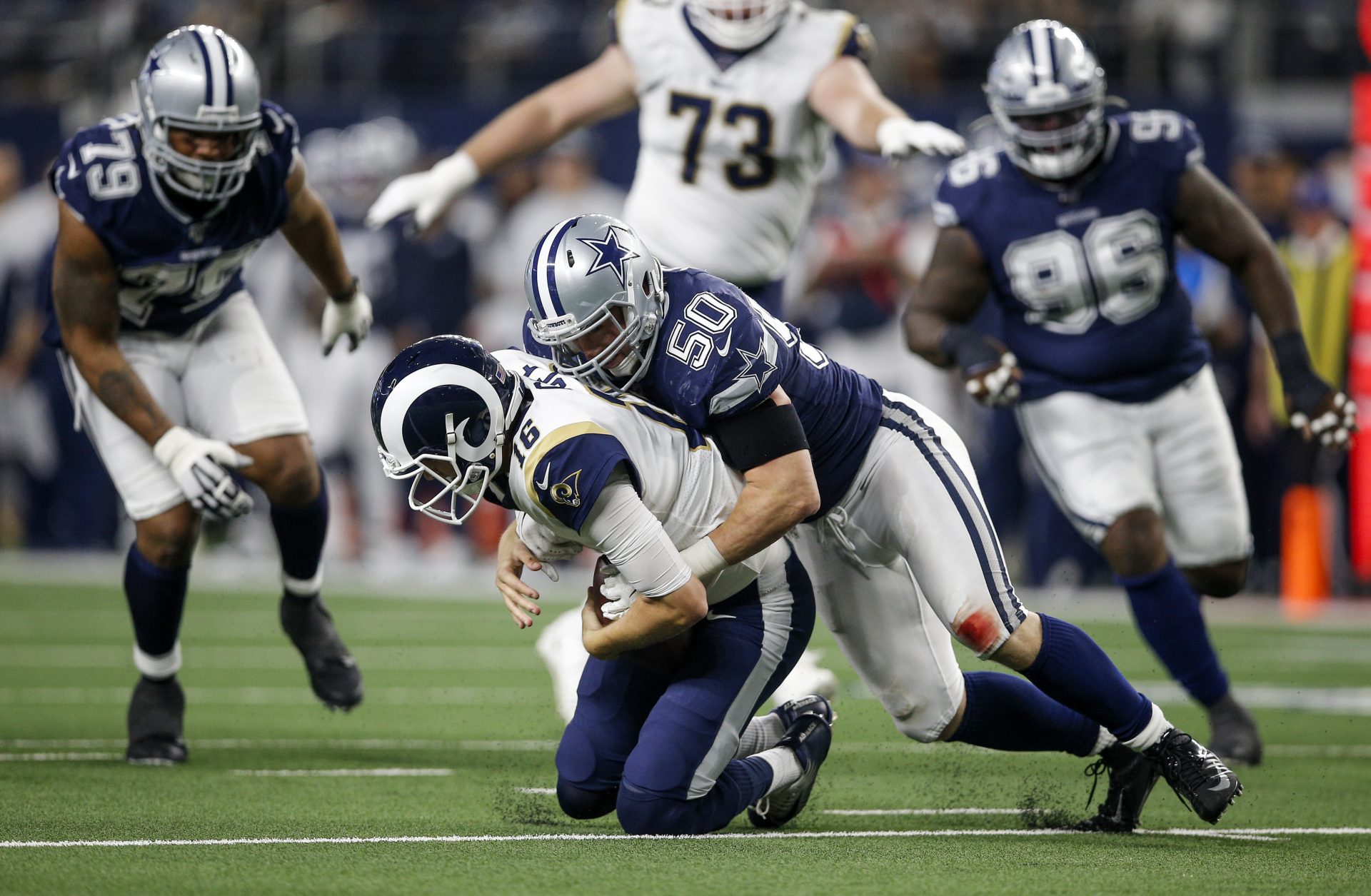 Dallas Cowboys outside linebacker Sean Lee (50) sacks Los Angeles Rams quarterback Jared Goff (16) during an NFL football game in Arlington, Texas, on Sunday, Dec. 15, 2019