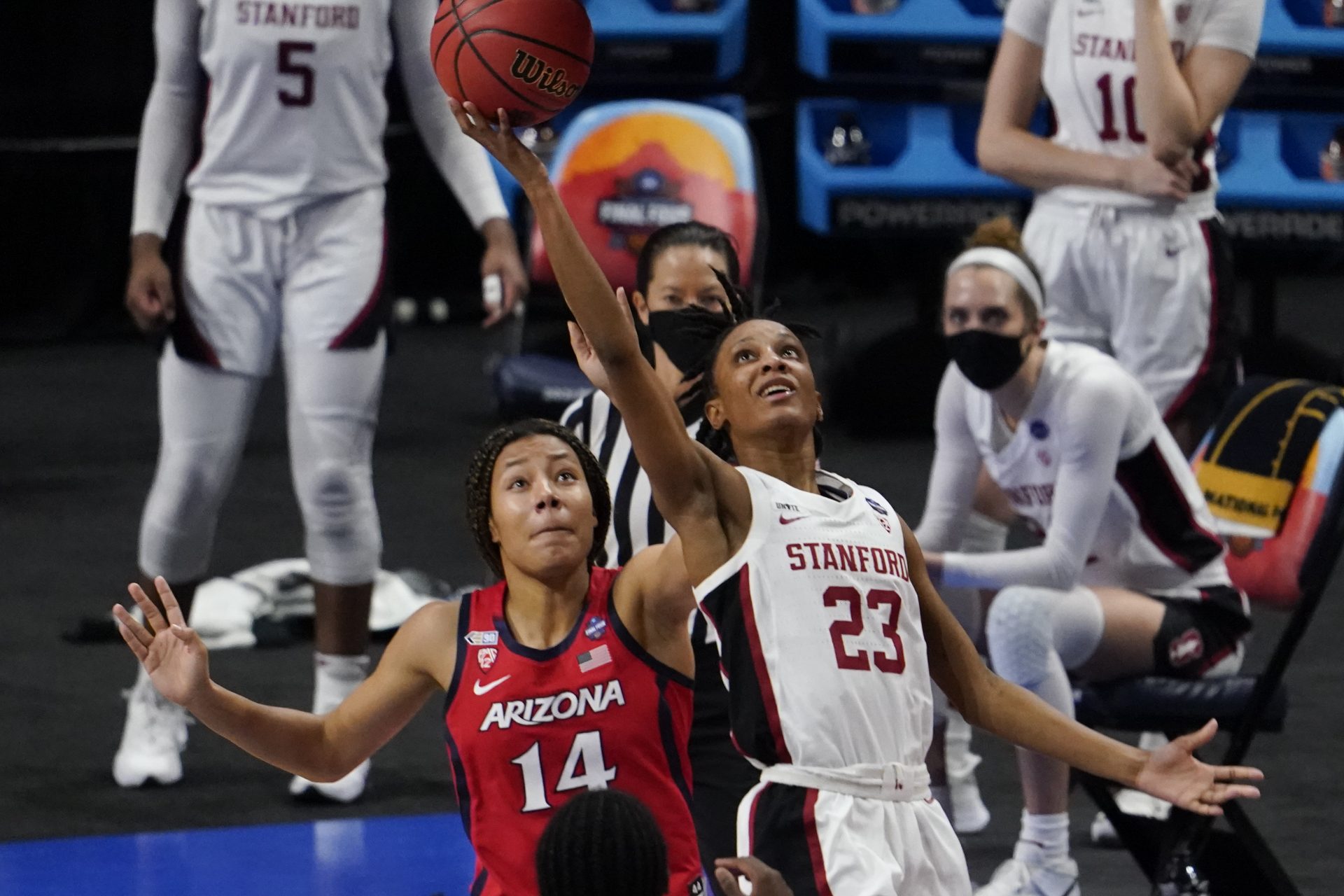 Stanford guard Kiana Williams (23) shoots over Arizona forward Sam Thomas (14) during the second half of the championship game in the women's Final Four NCAA college basketball tournament, Sunday, April 4, 2021, at the Alamodome in San Antonio.