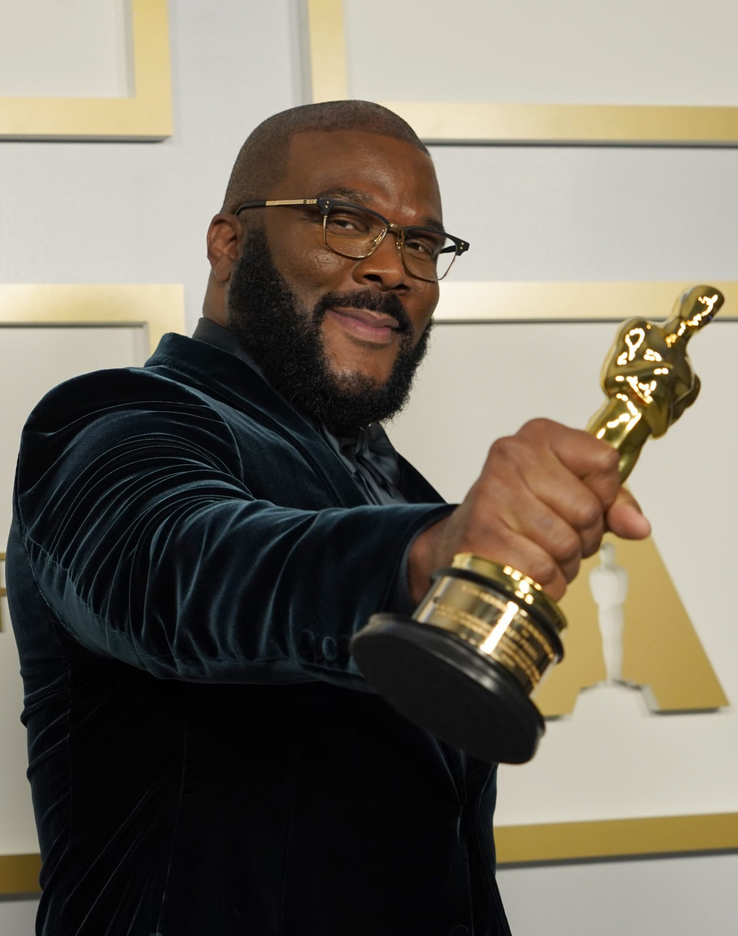 Tyler Perry, winner of the Jean Hersholt Humanitarian Award, poses in the press room at the Oscars on Sunday, April 25, 2021, at Union Station in Los Angeles.