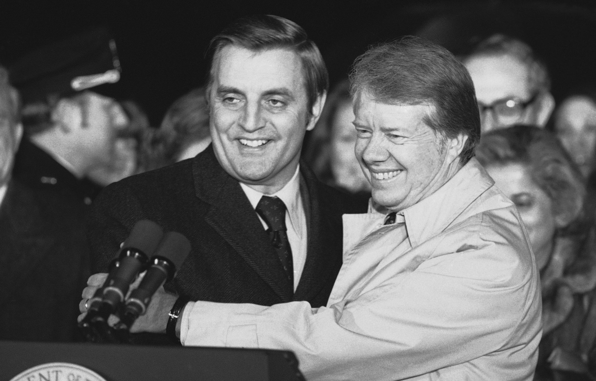 President Jimmy Carter embraces Vice President Walter Mondale on the South Lawn of the White House in Washington on Jan. 7, 1978, after Carter returned from a nine-day overseas trip.