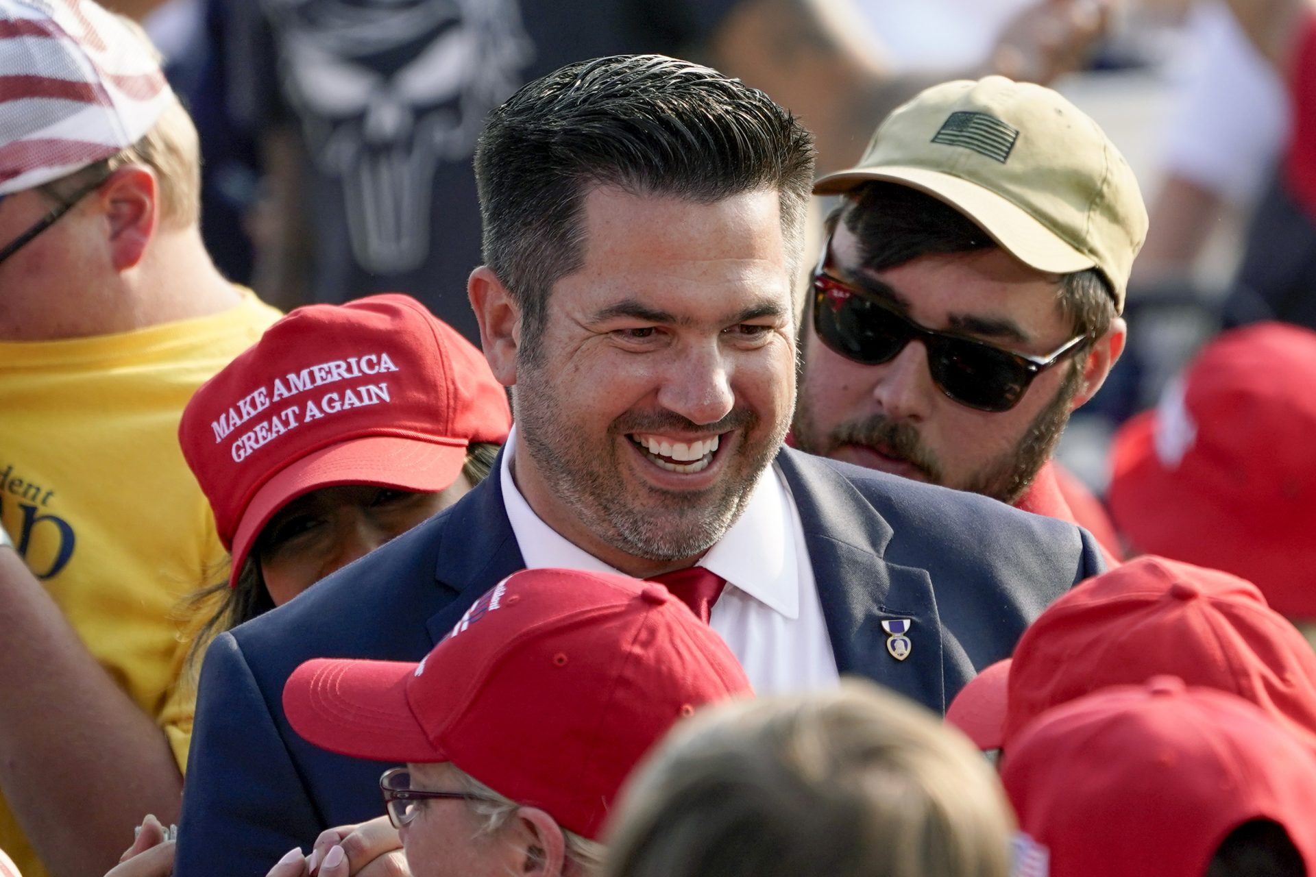 FILE PHOTO: In this Sept. 22, 2020 file photo, Sean Parnell walks through people gathered at a campaign rally for President Donald Trump at the Pittsburgh International Airport in Moon Township, Pa.