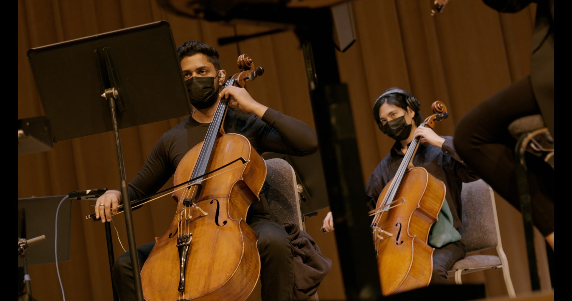 Cellists recording.