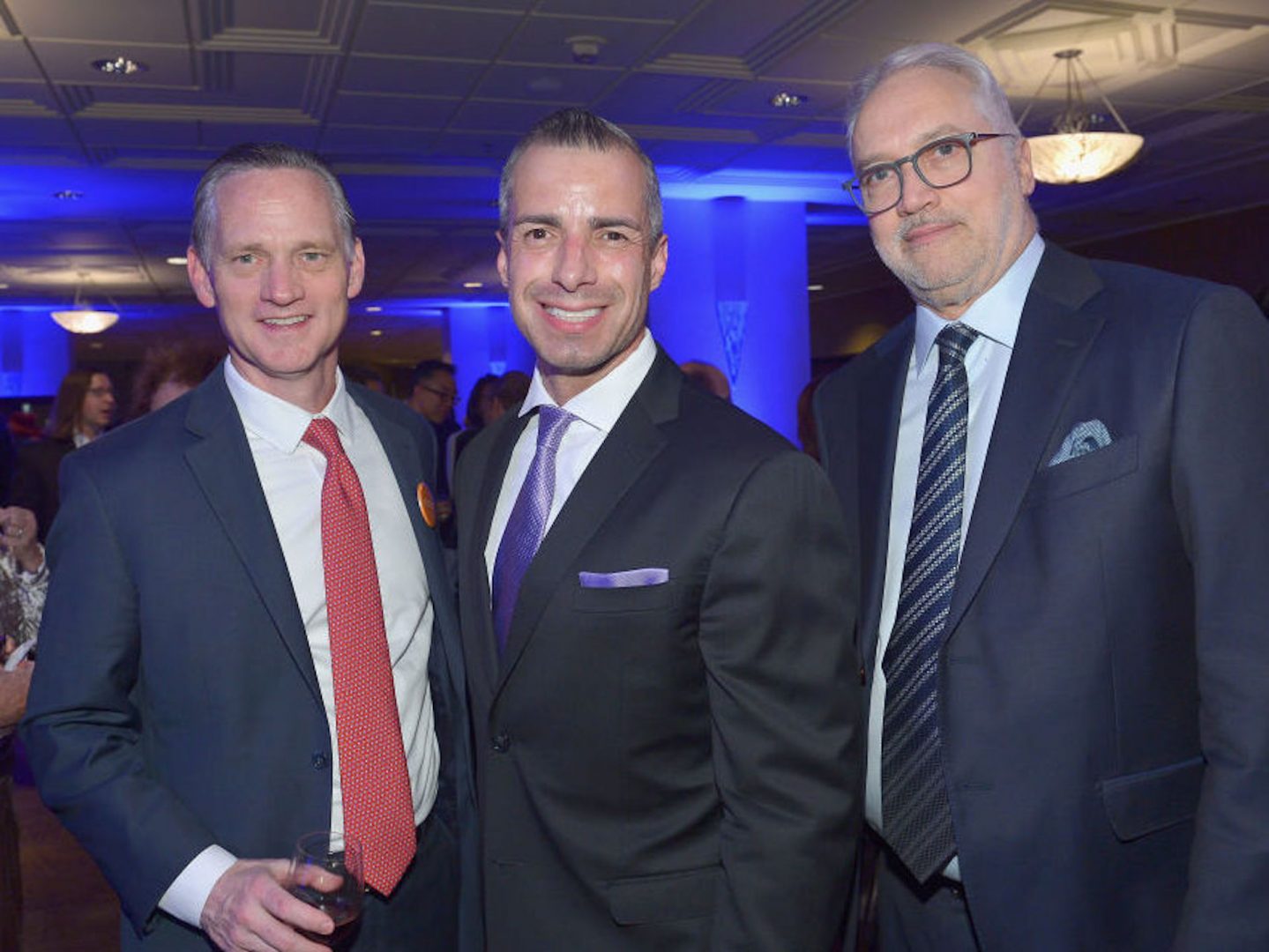 A Martinez (center) has been named a new co-host for NPR's Morning Edition. He is shown with Southern California Public Radio CEO Herb Scannell (right) at a fundraising gala for KPCC in March 2019.
