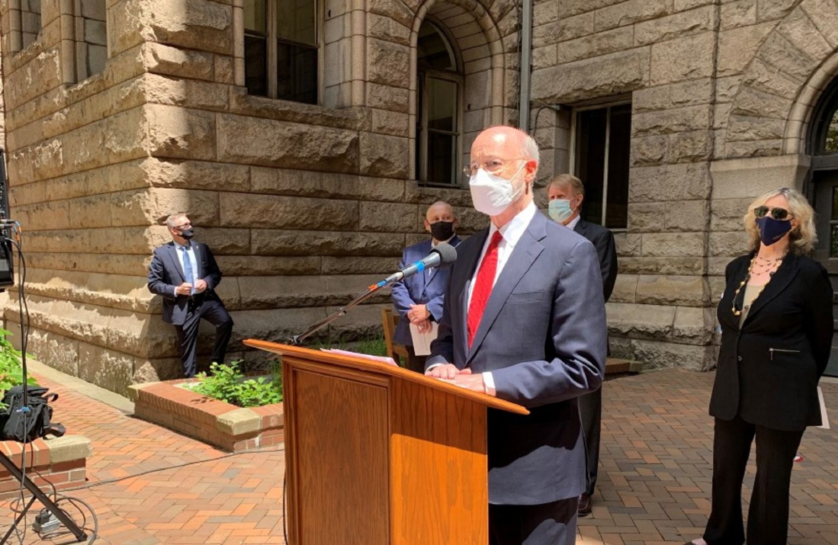 During a stop in Pittsburgh Wednesday, May 12, Governor Tom Wolf called on Pennsylvania voters to reject two ballot questions that would weaken the executive branch’s authority to declare states of emergency.