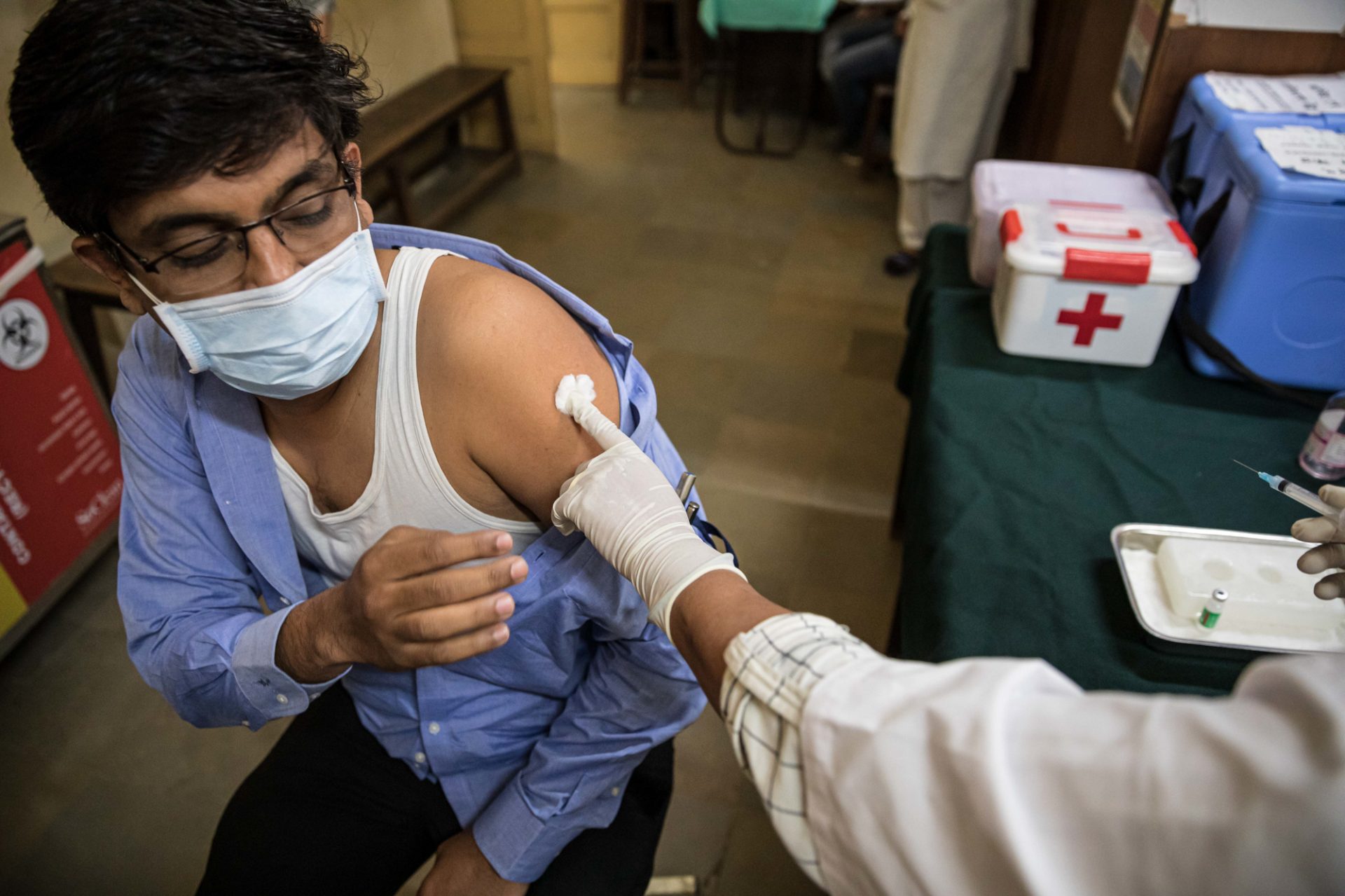 Amit Sonawane, 35, an engineer at a district health office, gets his first vaccine dose in Palghar, India.