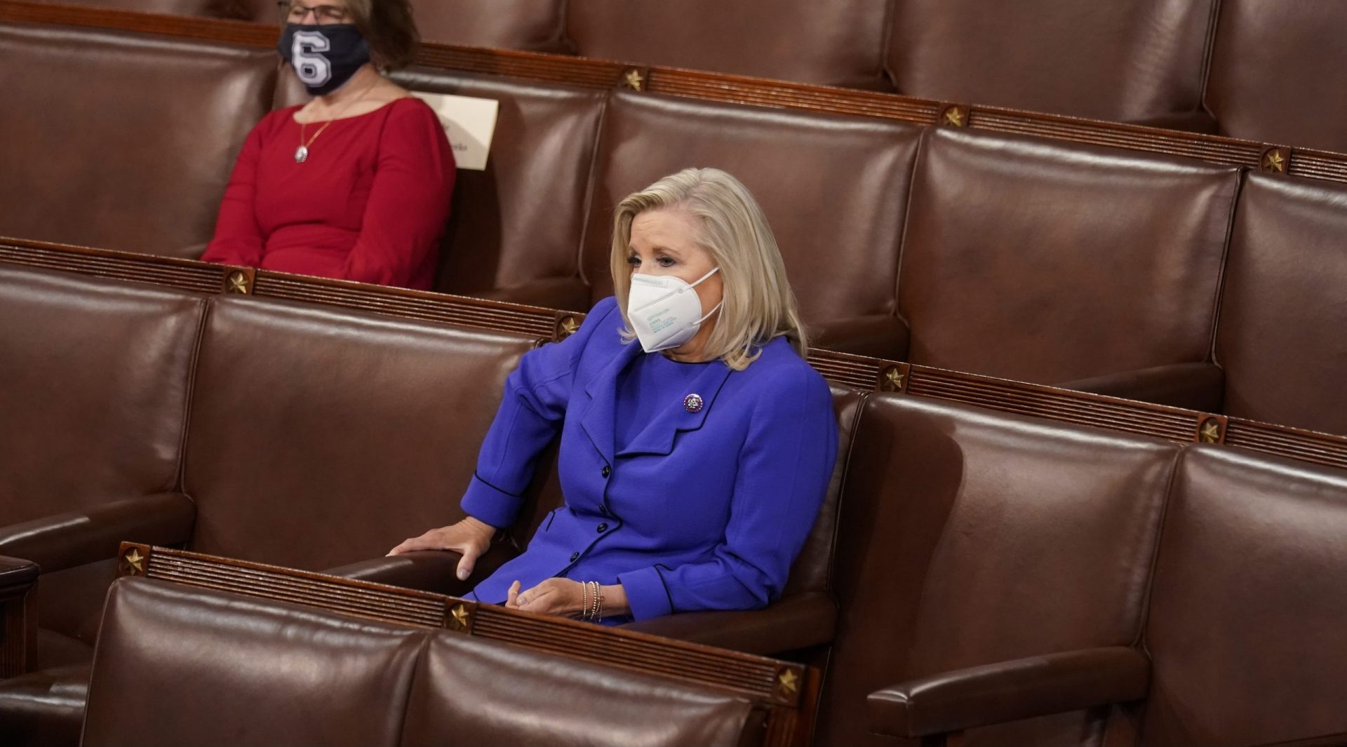 Rep. Liz Cheney, R-Wyo., front, listens as President Joe Biden speaks to a joint session of Congress Wednesday, April 28, 2021, in the House Chamber at the U.S. Capitol in Washington.