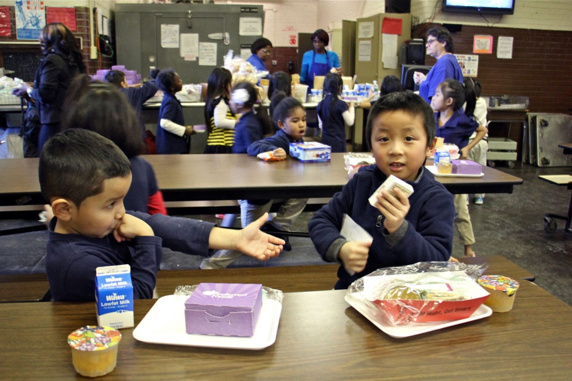 Children at Southwark School eat their school lunches from styrofoam trays, Dec. 20, 2016.