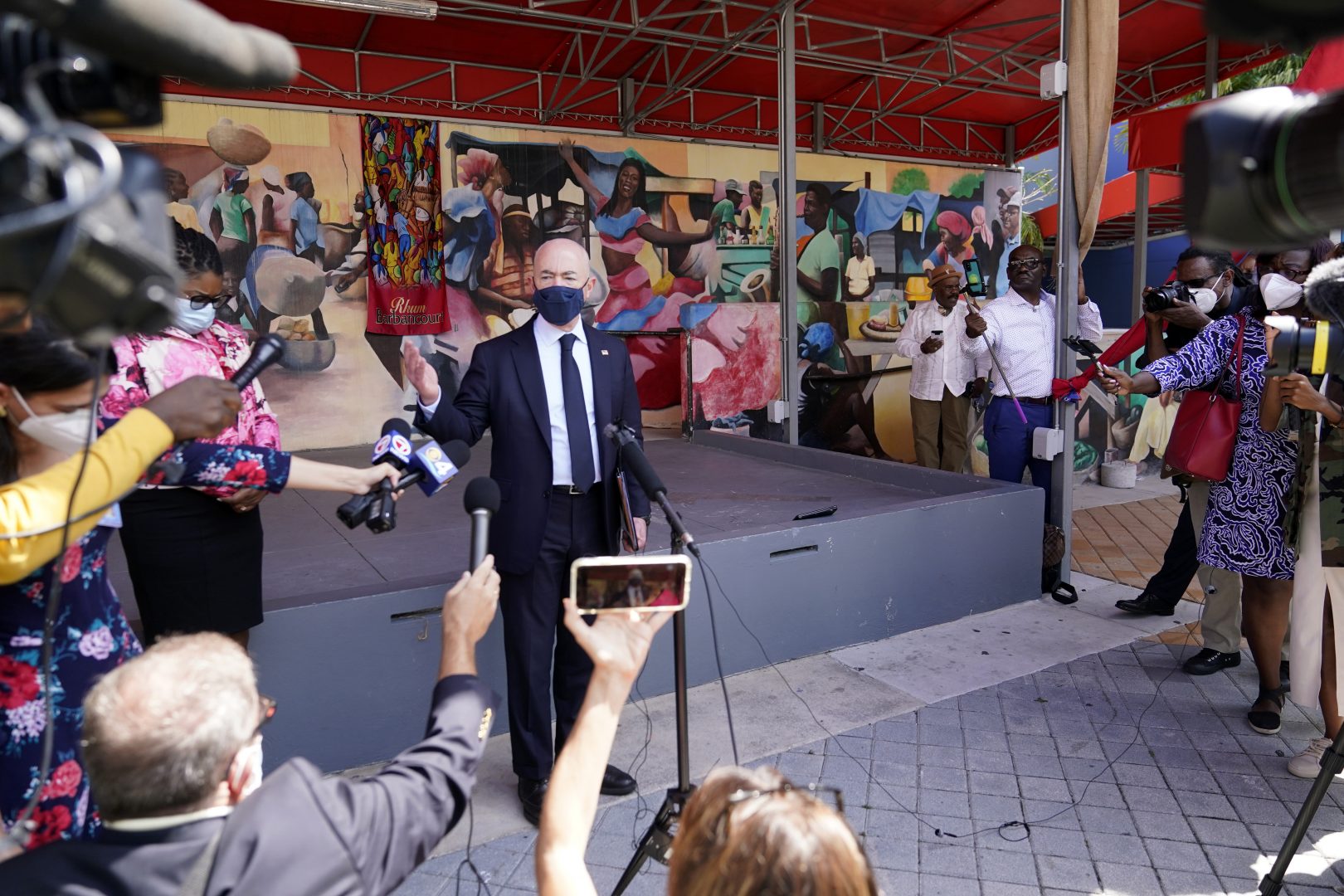 Secretary of Homeland Security Alejandro Mayorkas speaks with the news media outside of the Little Haiti Cultural Center, Tuesday, May 25, 2021, in Miami. Mayorkas met with community leaders following the announcement of a new 18-month designation for Haiti for Temporary Protected Status (TPS). (AP Photo/Lynne Sladky)