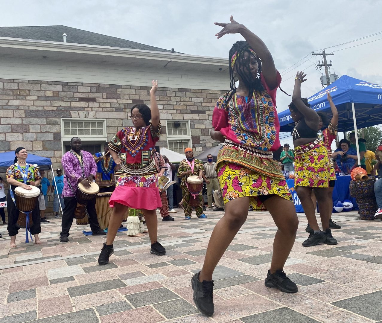 Dancers perform traditional West African dance at Broad Street Market in Harrisburg, Pa. June 19, 2021. 