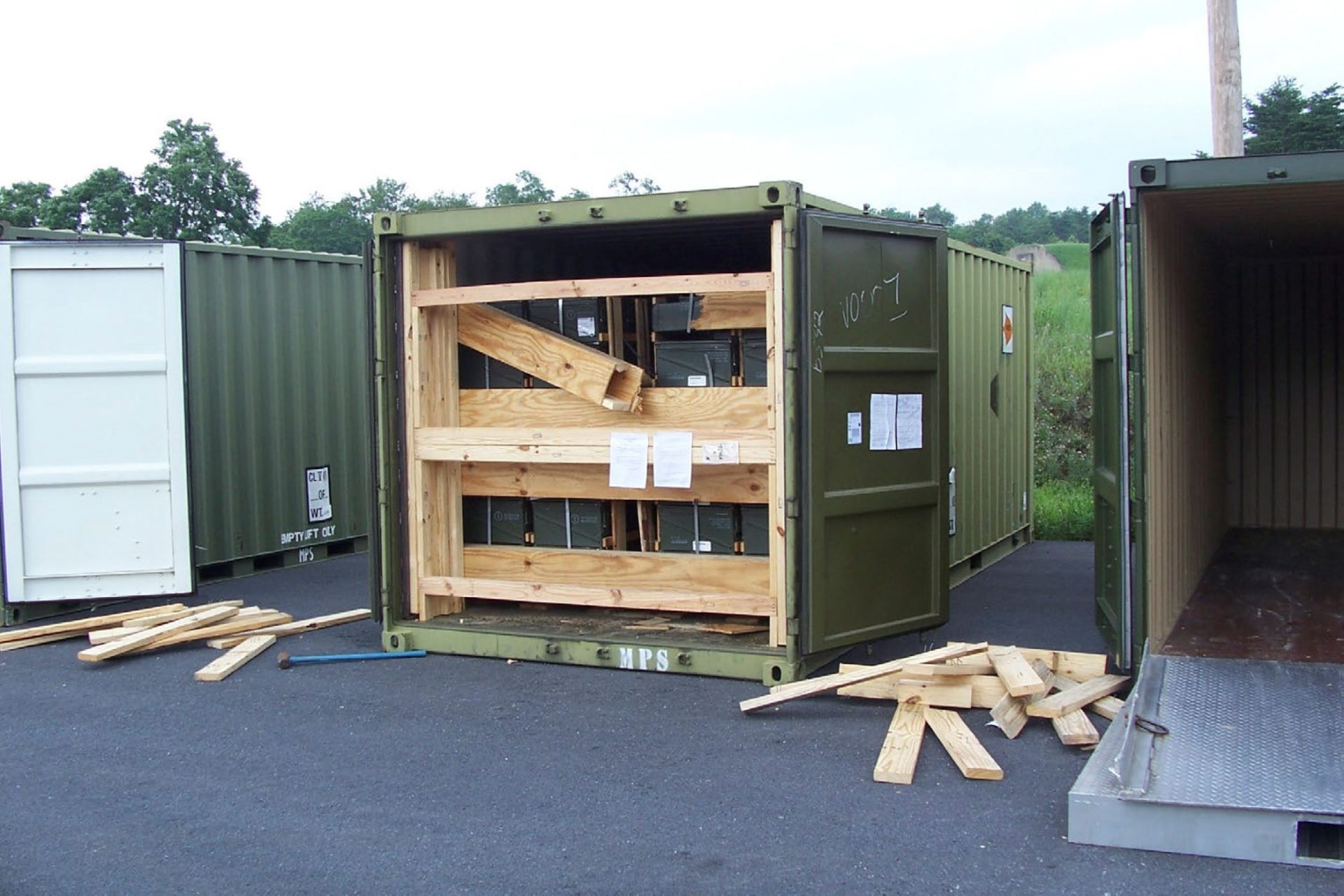 In this July 13, 2017, image provided by the U.S. Army Criminal Investigation Command on Feb. 9, 2021, a storage container of explosive ordnance shows signs of theft after arriving at the Letterkenny Army Depot in Chambersburg, Pa. An ammunition canister containing 32 rounds of 40mm M430A1 grenades, property of the U.S. Marine Corps, was missing.