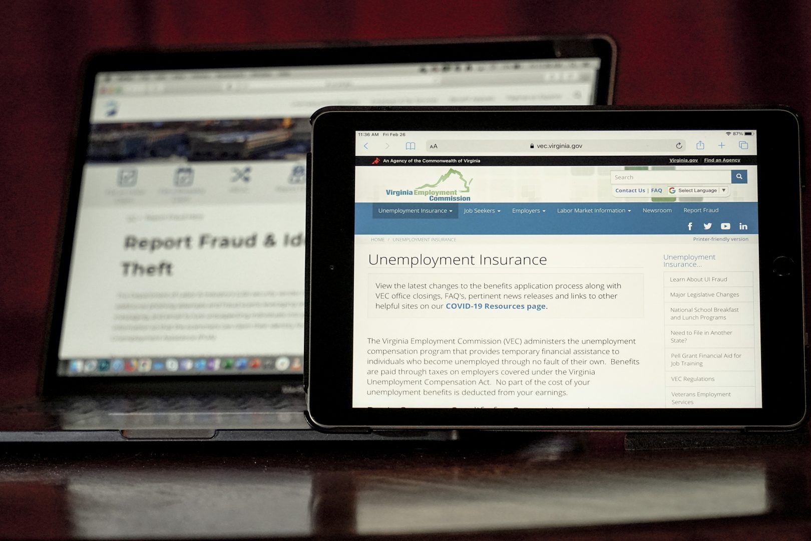 Web pages used to show information for collecting unemployment insurance in Virginia, right, and reporting fraud and identity theft in Pennsylvania, are displayed on the respective state web pages, Friday, Feb. 26, 2021, in Zelienople, Pa.