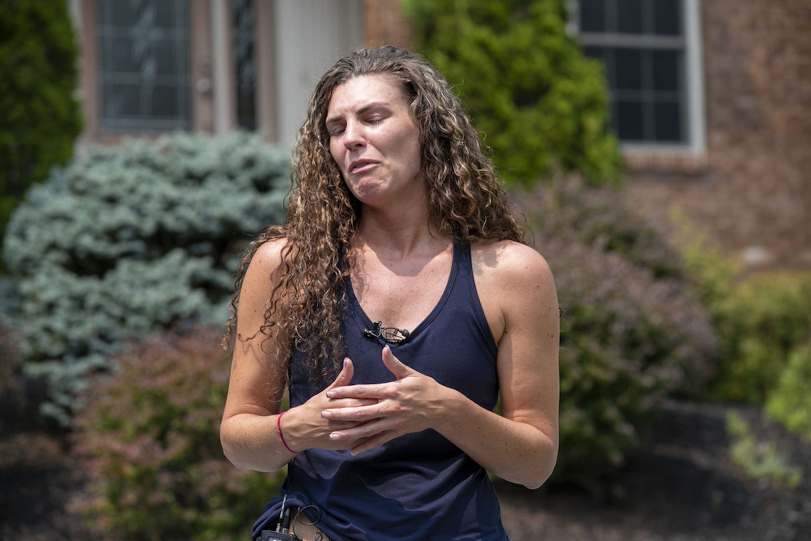 Brianne Shuller speaks to the media outside her Fishing Creek Valley home where Pennsylvania State Troopers shot and killed her husband, Mitchell James Shuller, on July 20, 2021.