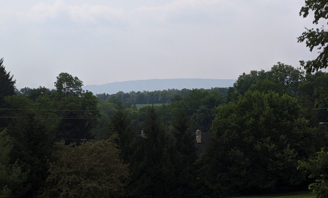 Haze from wildfires covers a mountain seen from Swatara Township, Dauphin County on Wednesday, July 21, 2021.