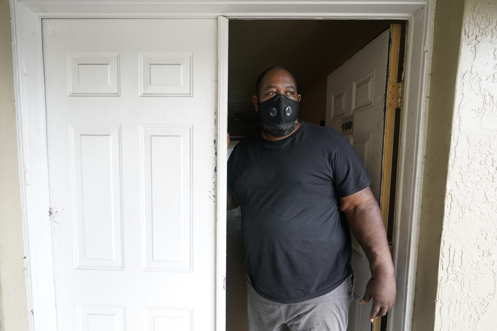 FILE PHOTO: Freddie Davis poses for a photo in his apartment June 21, 2021, in Miami. Davis, a truck driver who lost his job during the pandemic, saw his rent increase from $875 to $1,400 a month. He applied for rental assistance but his landlord refused to take it.