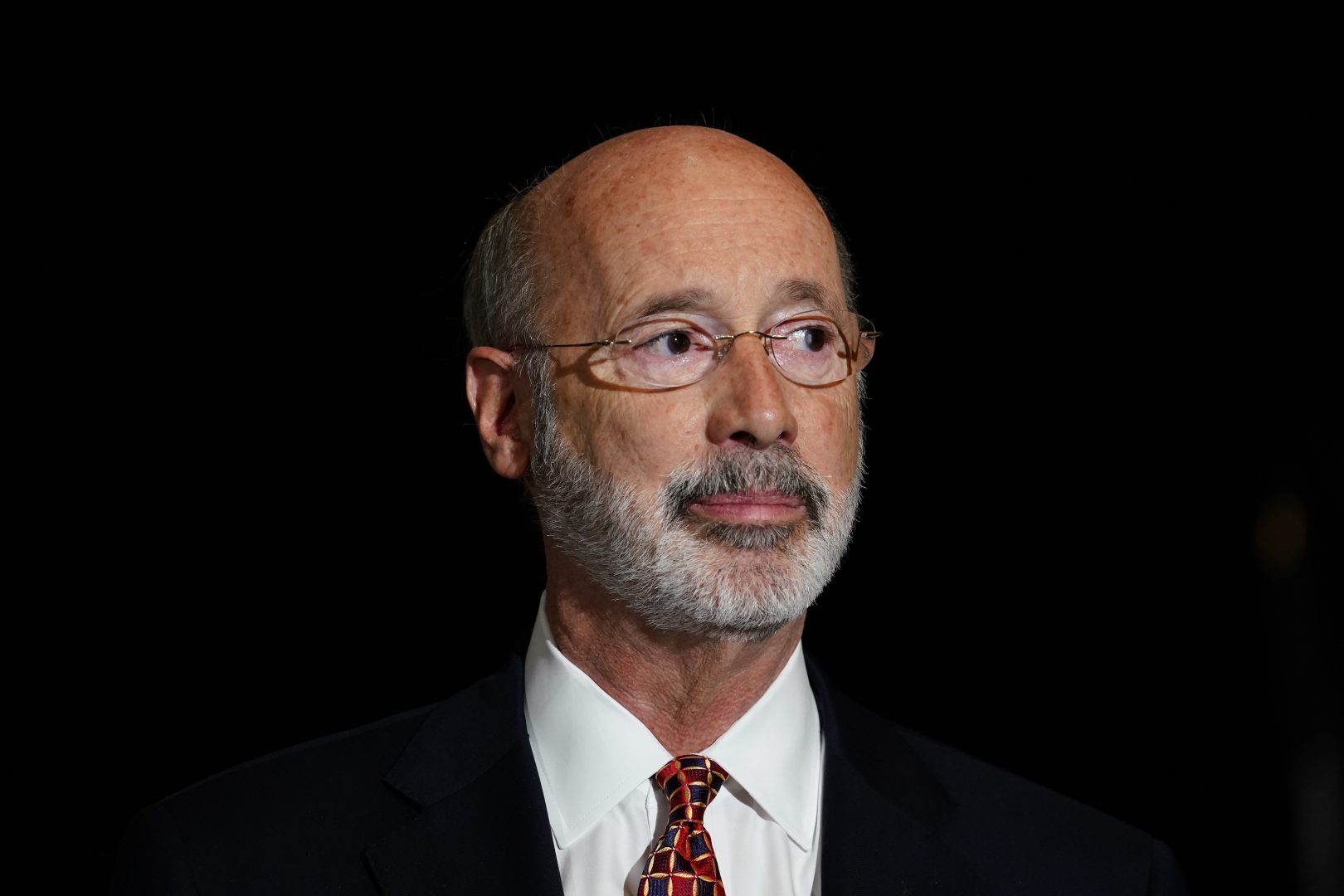 Pennsylvania Gov. Tom Wolf pauses while speaking during a rally at Sharon Baptist Church, Friday, July 9, 2021, in Philadelphia.