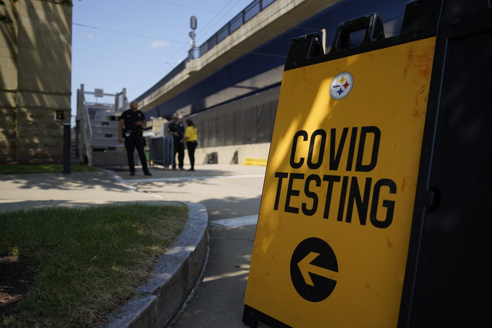 A COVID testing area sign is outside Heinz Field before the NFL's 