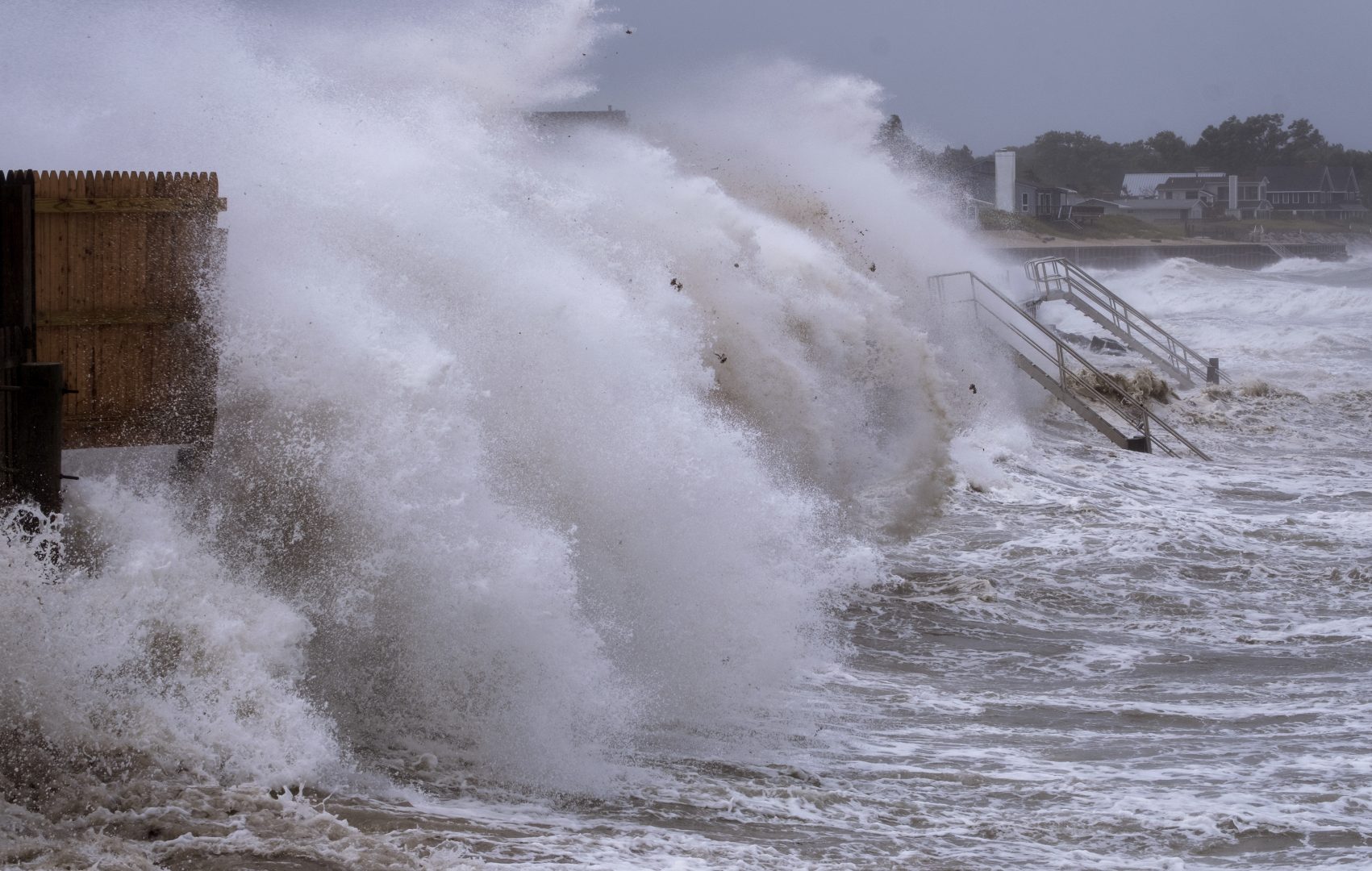 Waves pound the seawall in Montauk, N.Y., Sunday, Aug. 22, 2021, as Tropical Storm Henri affects the Atlantic coast.