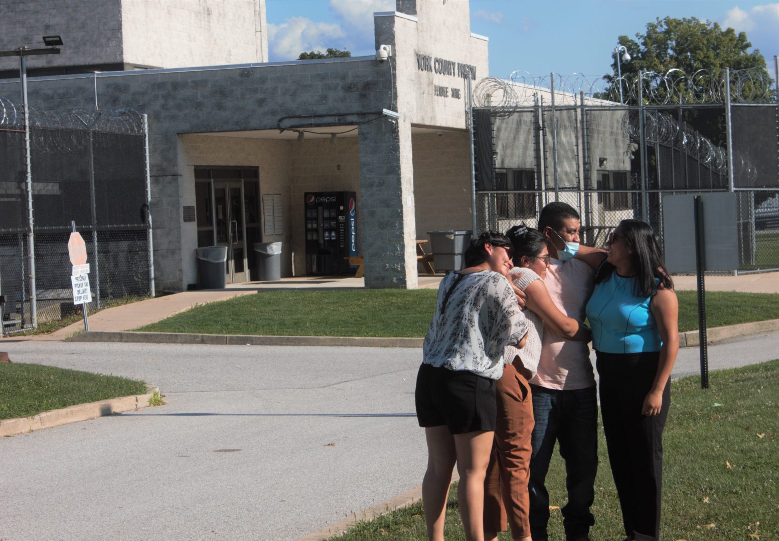 The Carmonas hug after Alfredo Carmona, an Immigrations and Customs Enforcement detainee at York County Prison, was released on humanitarian parole on Aug. 2. 