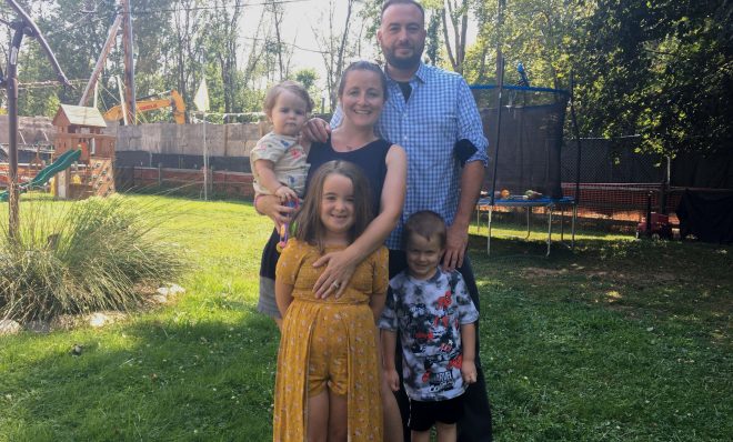 Megan and Bob White with their three kids in their Chester County backyard. Work on the Mariner East 2 pipeline has turned half the property into a construction site, and the project has been plagued by sinkholes and schedule overruns.