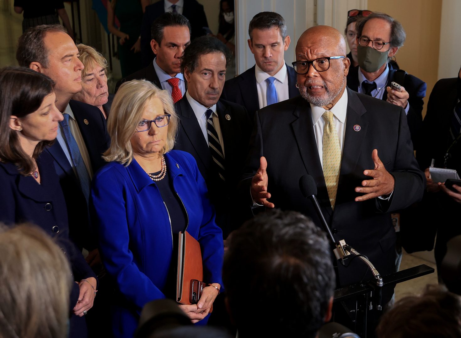 Reps. Bennie Thompson (right) and Liz Cheney, joined by fellow committee members, speak to the media after a July 27 hearing of the House select committee investigating the Jan. 6 attack on the U.S. Capitol.