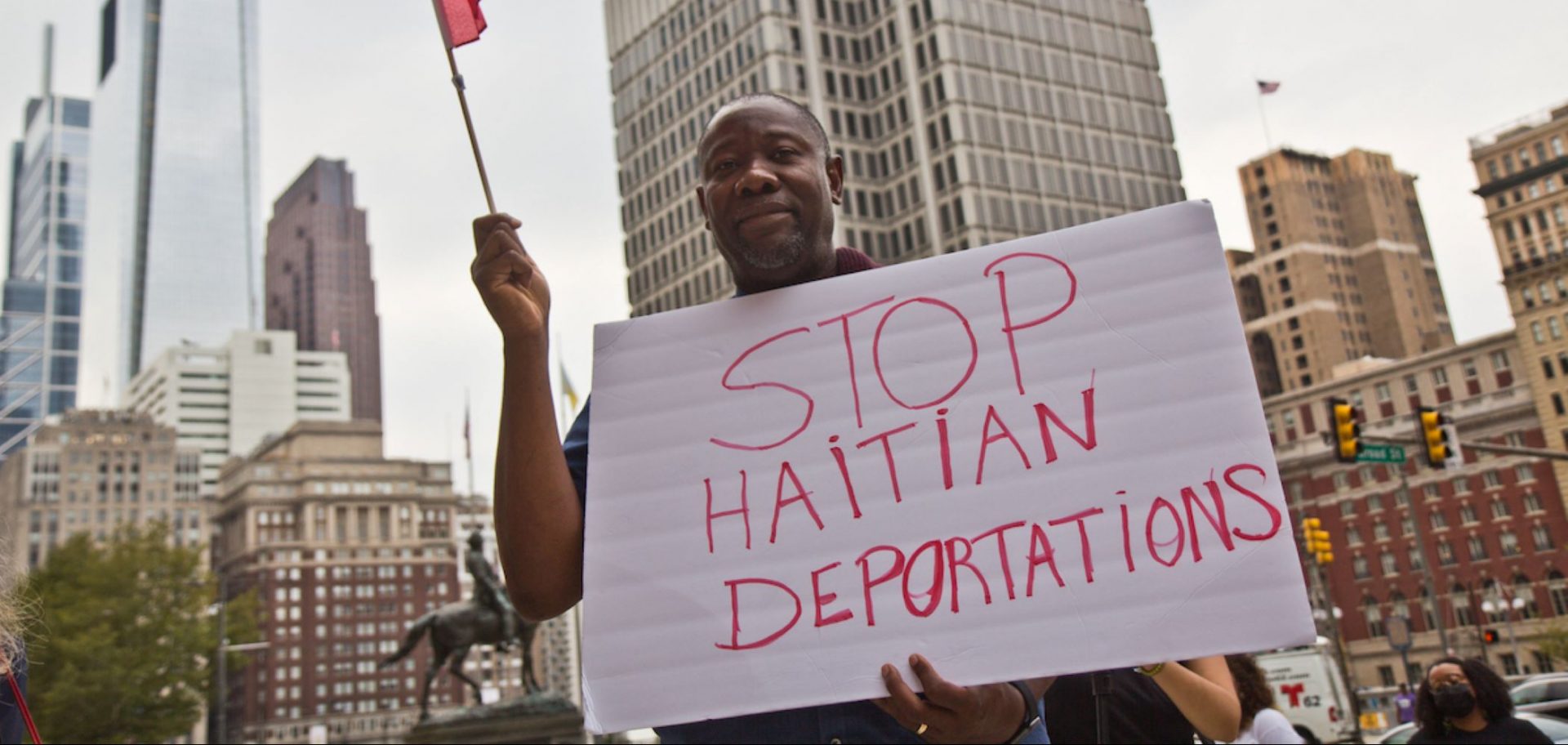 Joel Leon protested in solidarity with Haitians at the border and against the Biden administration’s deportation of Haitian asylum-seekers at City Hall in Philadelphia on Sept. 28, 2021