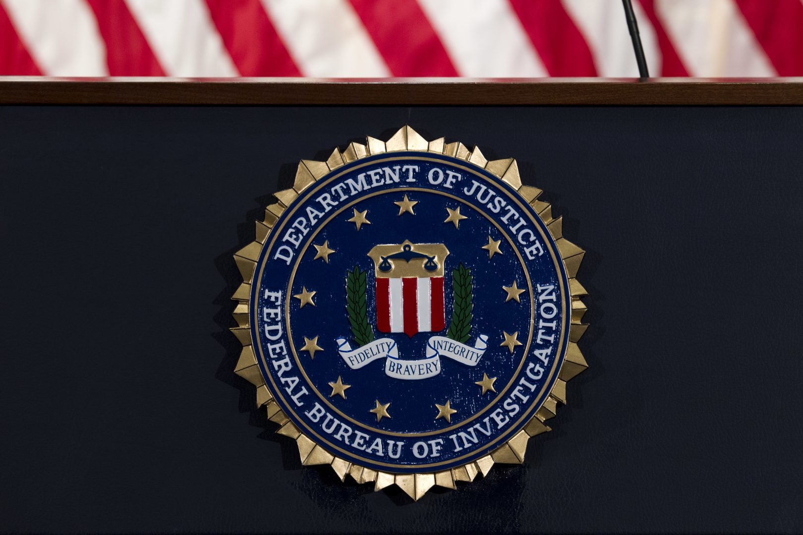 FILE PHOTO: The FBI seal is seen before a news conference at FBI headquarters in Washington on June 14, 2018.