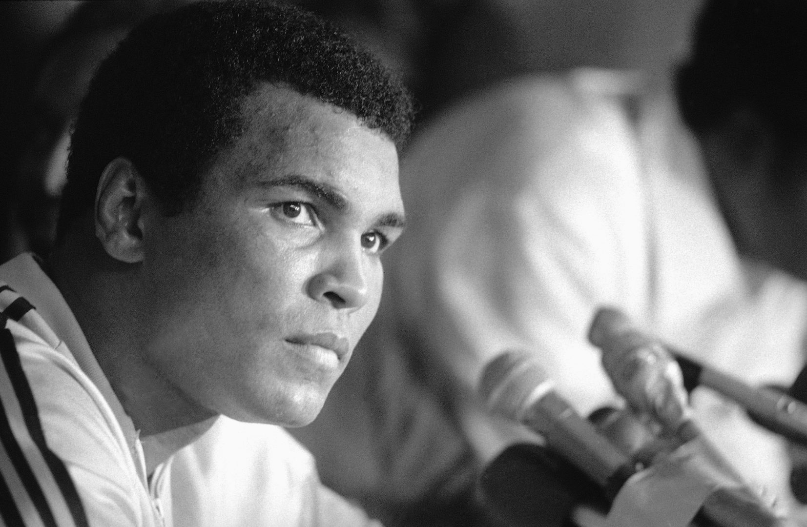 Muhammad Ali ponders a question at news conference following his WBA heavyweight title bout with Leon Spinks in New Orleans on Friday, Sept. 16, 1978. Ali regained his title with a 15-round unanimous decision.