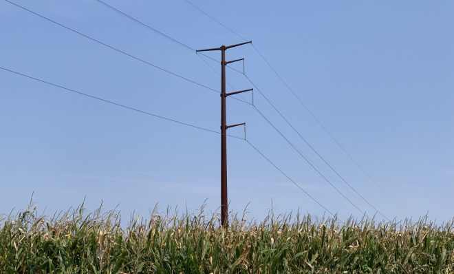 A transmission line stands in a cornfield in Chanceford Township, York County on Sept. 13, 2021.