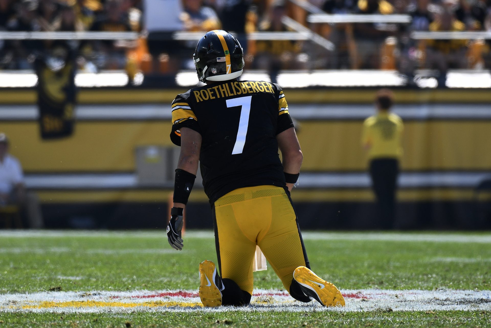 Pittsburgh Steelers quarterback Ben Roethlisberger (7) gets up slowly after being sacked during the first half of an NFL football game against the Las Vegas Raiders in Pittsburgh, Sunday, Sept. 19, 2021.