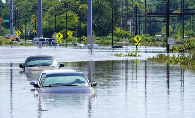 Vehicles are under water during flooding in Norristown, Pa. Thursday, Sept. 2, 2021 in the aftermath of downpours and high winds from the remnants of Hurricane Ida that hit the area.