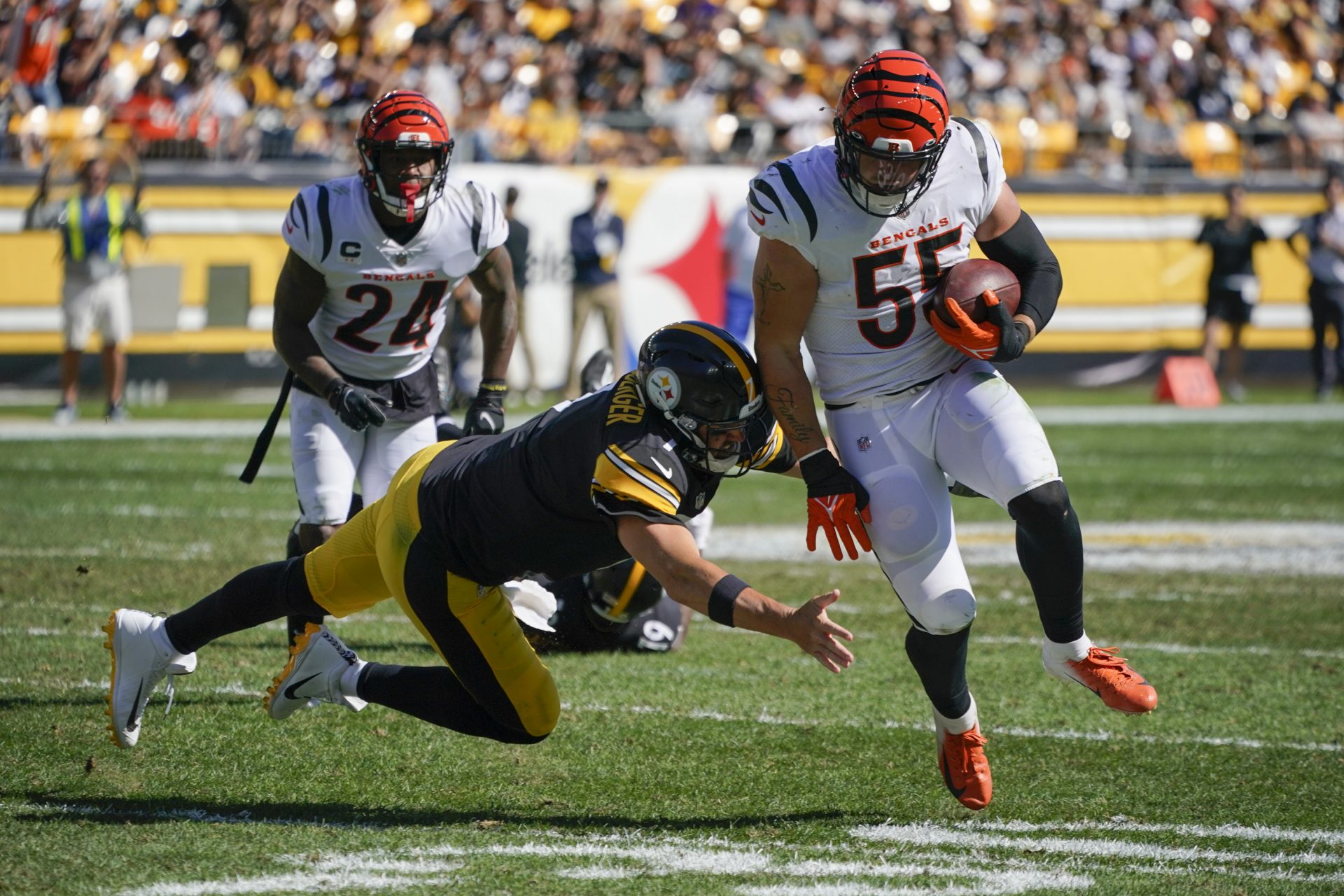 Cincinnati Bengals defensive end Trey Hendrickson (91) tackles Pittsburgh Steelers quarterback Ben Roethlisberger (7) during the second half an NFL football game, Sunday, Sept. 26, 2021, in Pittsburgh.