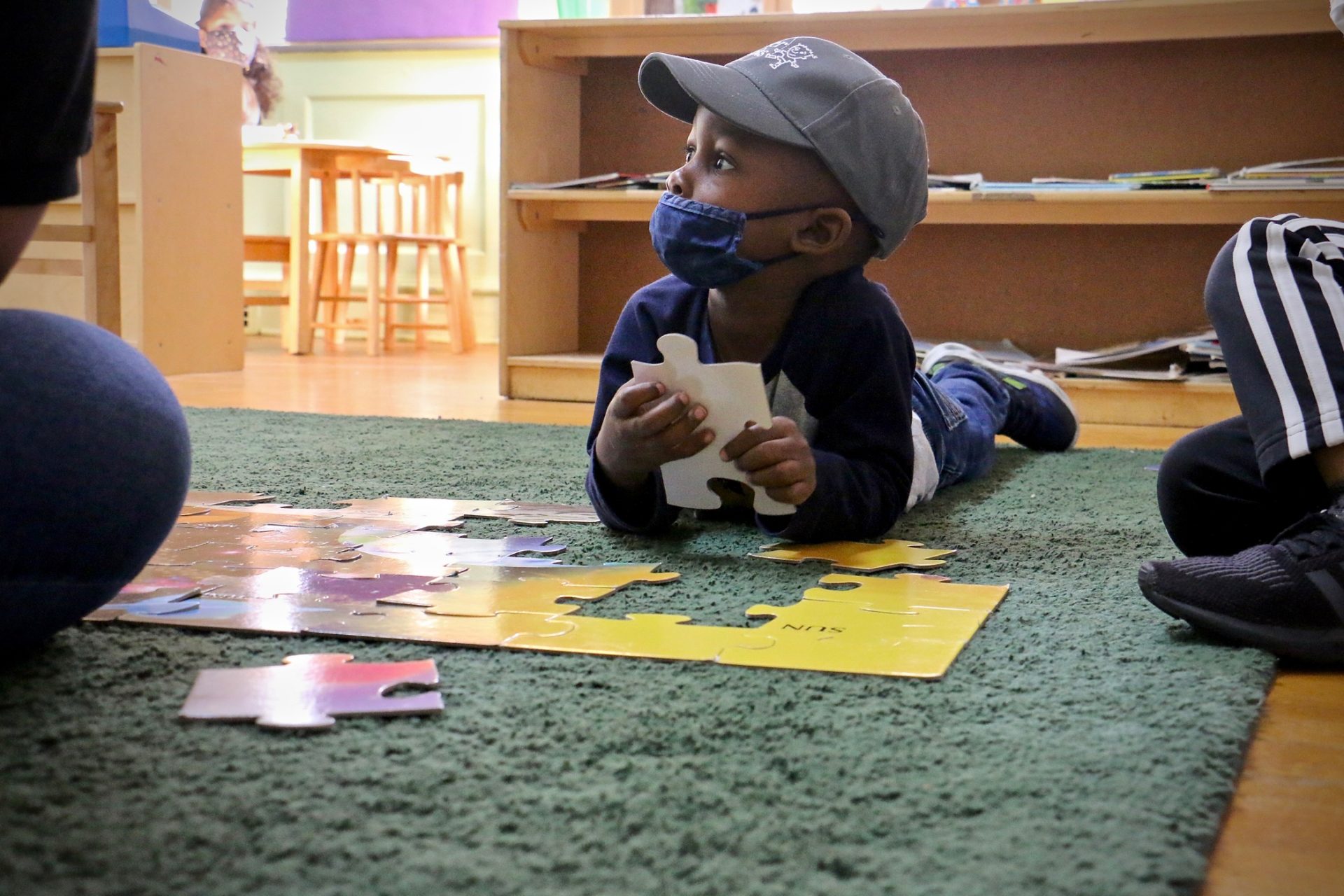 Gabriel Watson, 3, works on a puzzle during his preschool class at Children’s Playhouse Whitman in South Philadelphia. (