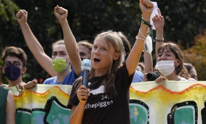 Climate activist, Greta Thunberg, of Sweden, delivers her speech during a Fridays for Future demonstration in Milan, Italy, Friday, Oct. 1, 2021.