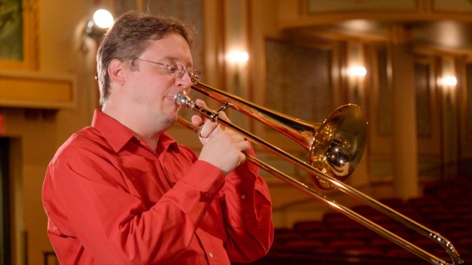 Greg Strohman playing trombone.