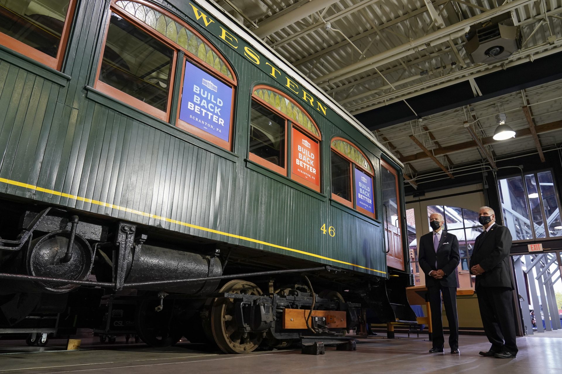 President Joe Biden tours the Electric City Trolley Museum with Wayne R. Hiller, executive director and manager of the museum, during a visit to his hometown of Scranton, Pa., Wednesday, Oct. 20, 2021