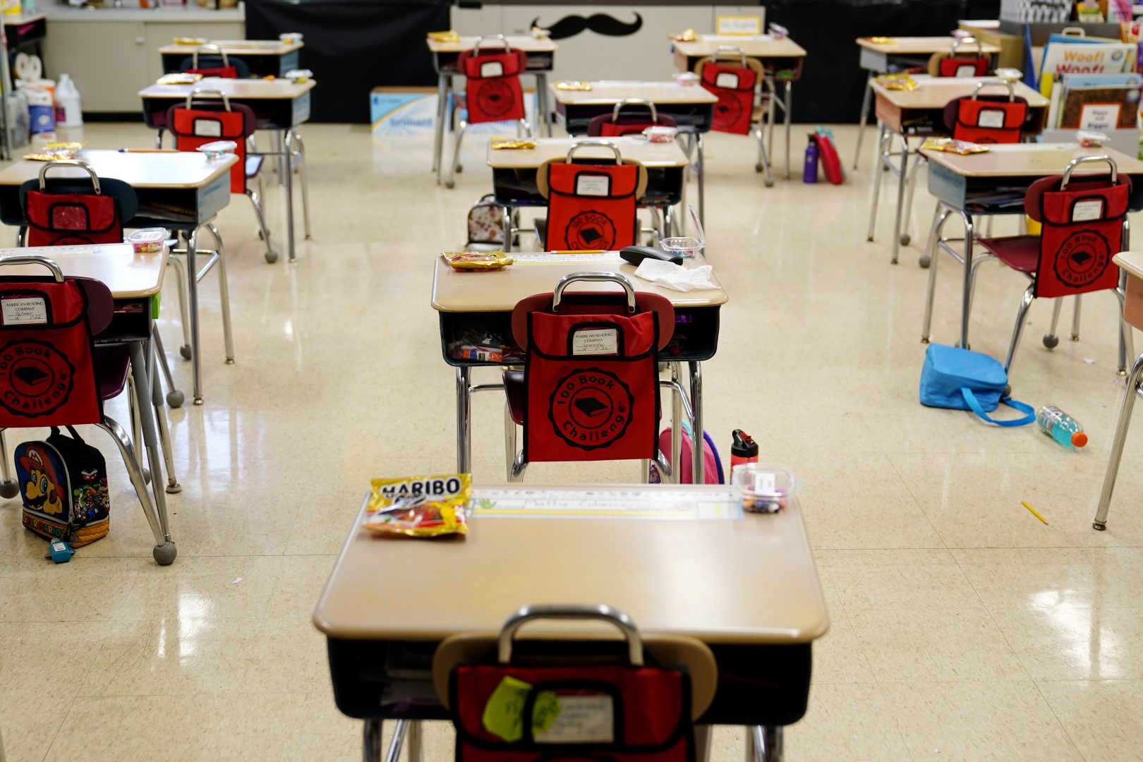 In this Thursday, March 11, 2021 file photo, desks are arranged in a classroom at an elementary school in Nesquehoning, Pa.