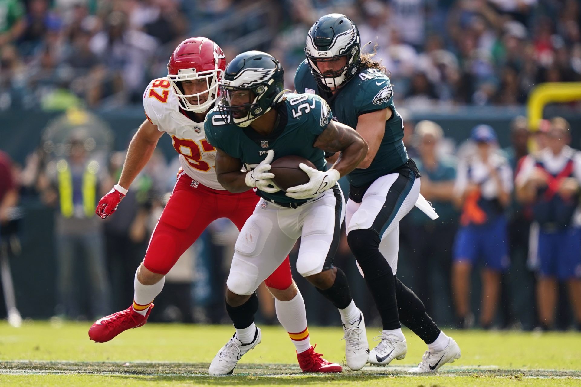 Philadelphia Eagles linebacker Eric Wilson (50) intercepts the ball in front of Kansas City Chiefs tight end Travis Kelce (87) during the second half of an NFL football game Sunday, Oct. 3, 2021, in Philadelphia.