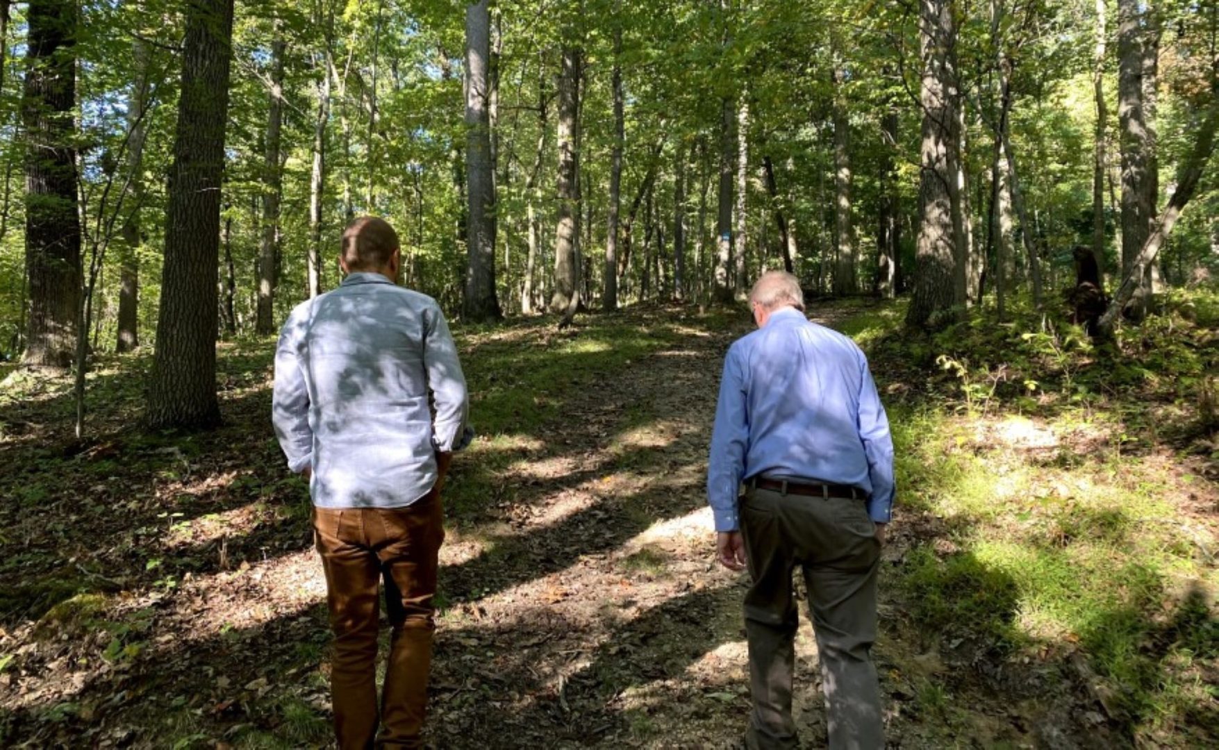 Researchers Ryan Utz, an assistant professor of water resources at Chatham University, and Walter Carson, an associate professor of plant community ecology at the University of Pittsburgh, walk through Eden Hall at Chatham University.