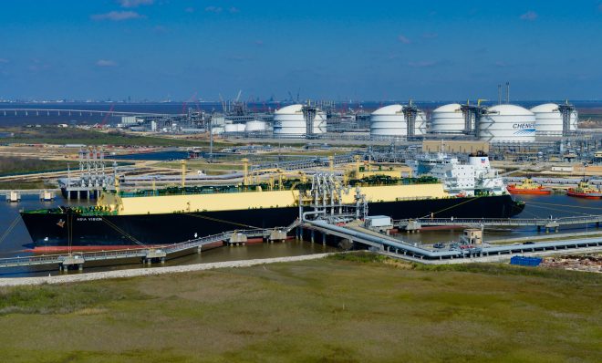 The Asia Vision LNG carrier ship sits docked at the Cheniere Energy Inc. terminal in this aerial photograph taken over Sabine Pass, Texas, U.S., on Wednesday, Feb. 24, 2016. Cheniere said in a statement last month. Cheniere Energy Inc. expects to ship the first cargo of liquefied natural gas on Wednesday to Brazil with another tanker to be loaded a few days later, marking the historic start of U.S. shale exports and sending its shares up the most in more than a month. Photographer: Lindsey Janies/Bloomberg via Getty Images