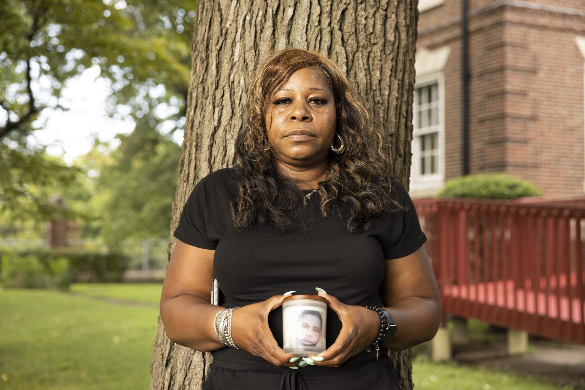 Shineka Crawford stands outside the Prince Hall Grand Lodge in Philadelphia on Monday, Aug. 23, 2021, where she came to drop off a memento of her son, Shaquille Barbour, 18, to The Gun Violence Memorial Project. Shaquille was shot 13 times and killed while riding his bike.
