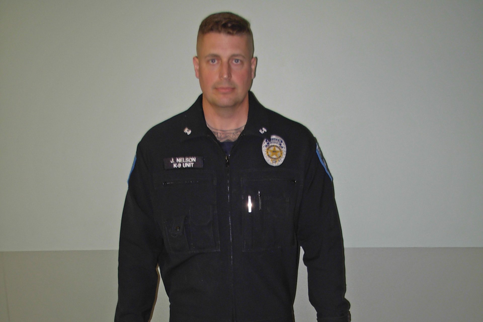 In this photo provided by the Auburn Police Department via the Port of Seattle Police Department, Auburn police Officer Jeff Nelson is shown.